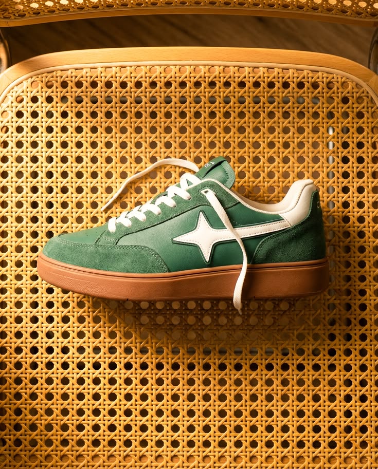 Green sneaker on a woven chair